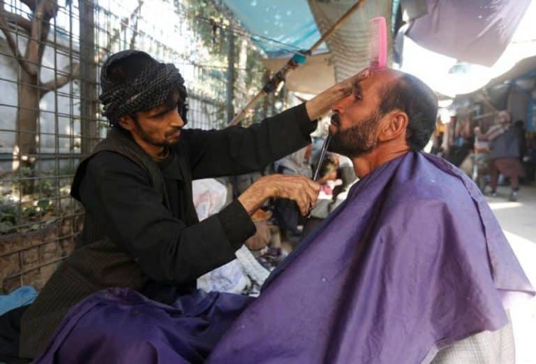 Taliban bans barbers from shaving beards, playing music