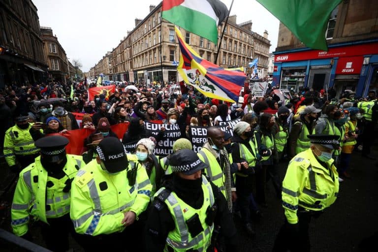 Thousands rally in rainy Glasgow for COP26 climate action