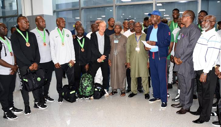 Super Eagles return to Nigeria from Cameroon