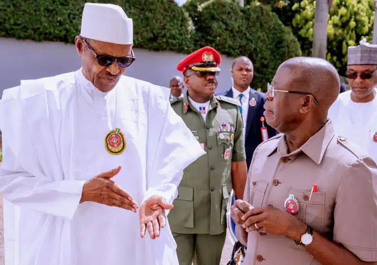 Buhari rejoices with Adams Oshiomhole at 70