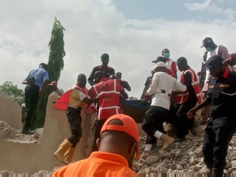 BREAKING: One dies, many trapped as demolished Kano Hotel collapses on ‘looters’