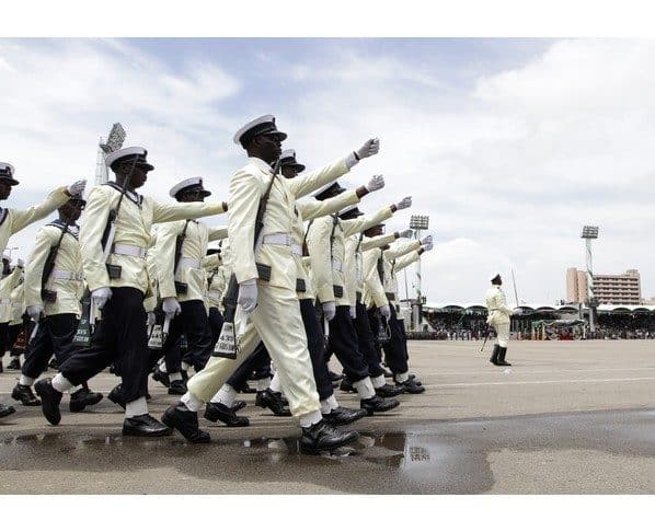 Members of the Nigerian Navy march at a parade marking the 50th anniversary of the country's independence in Abuja October 1, 2010. Car bomb explosions killed eight people and injured three near a parade in Nigeria's capital on Friday, police said. REUTERS/Afolabi Sotunde (NIGERIA - Tags: POLITICS ANNIVERSARY MILITARY)