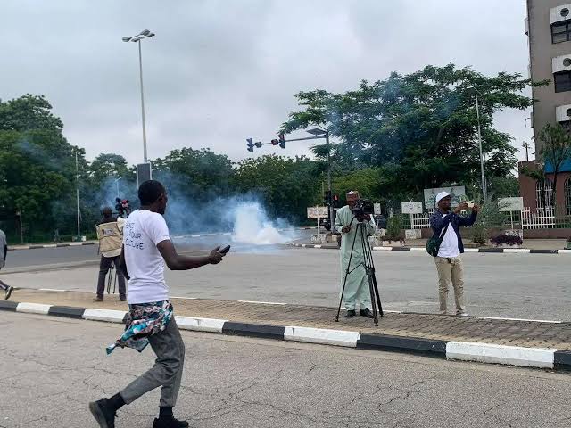 Security operatives disperse protesters, journalists at Abuja stadium